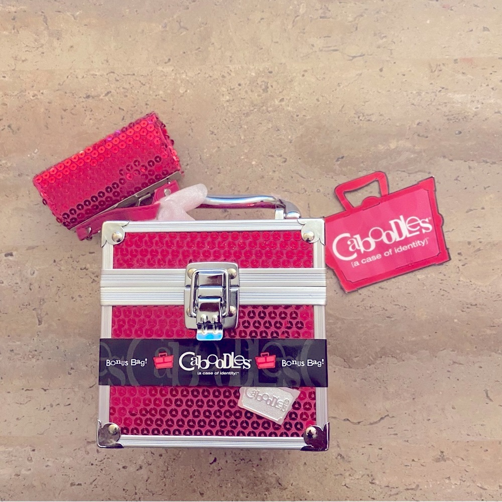 NWT!  Caboodles pink sequin mini case with bonus bag.